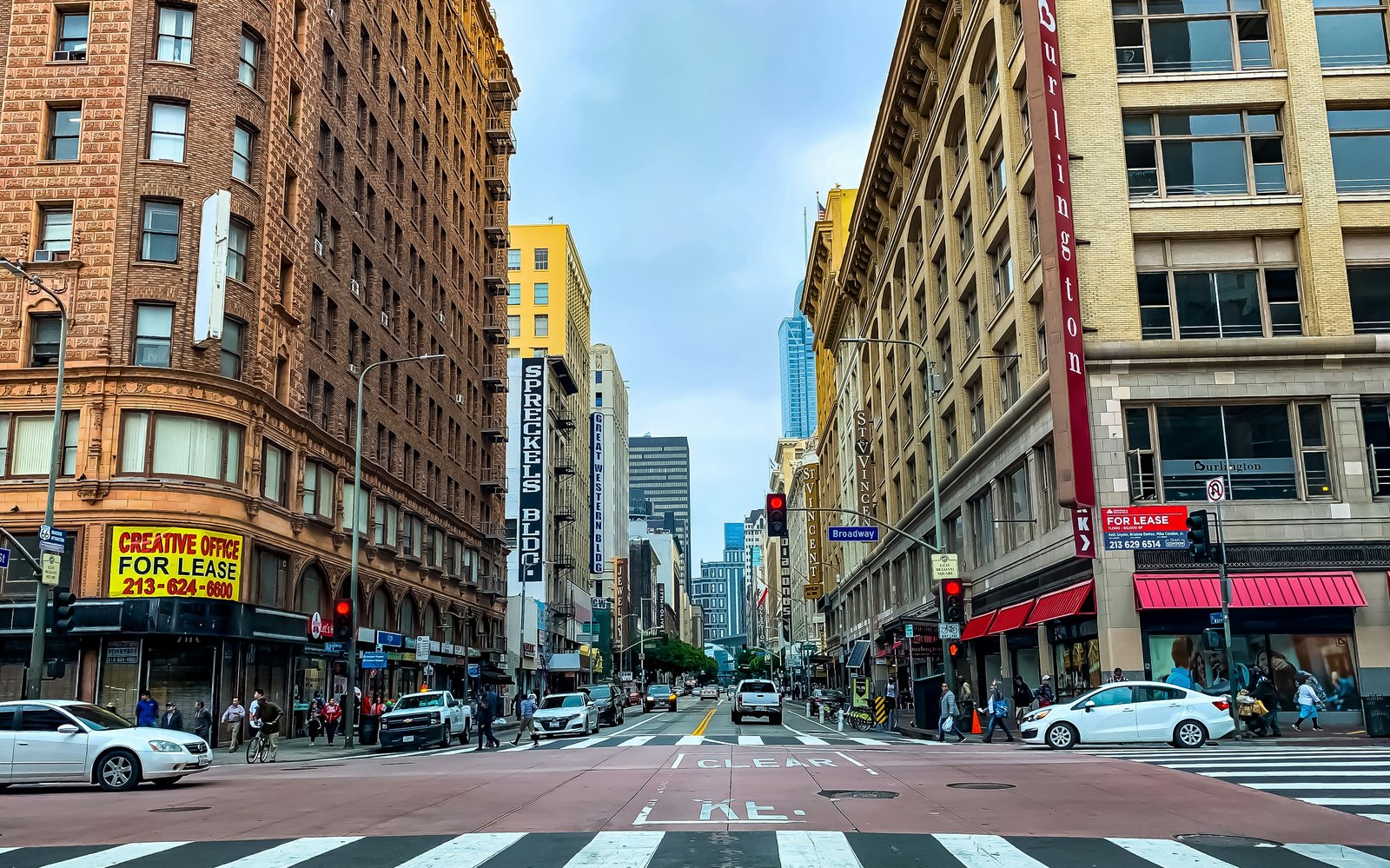 A Downtown Los Angeles street of early-1900s brick and terra-cotta buildings